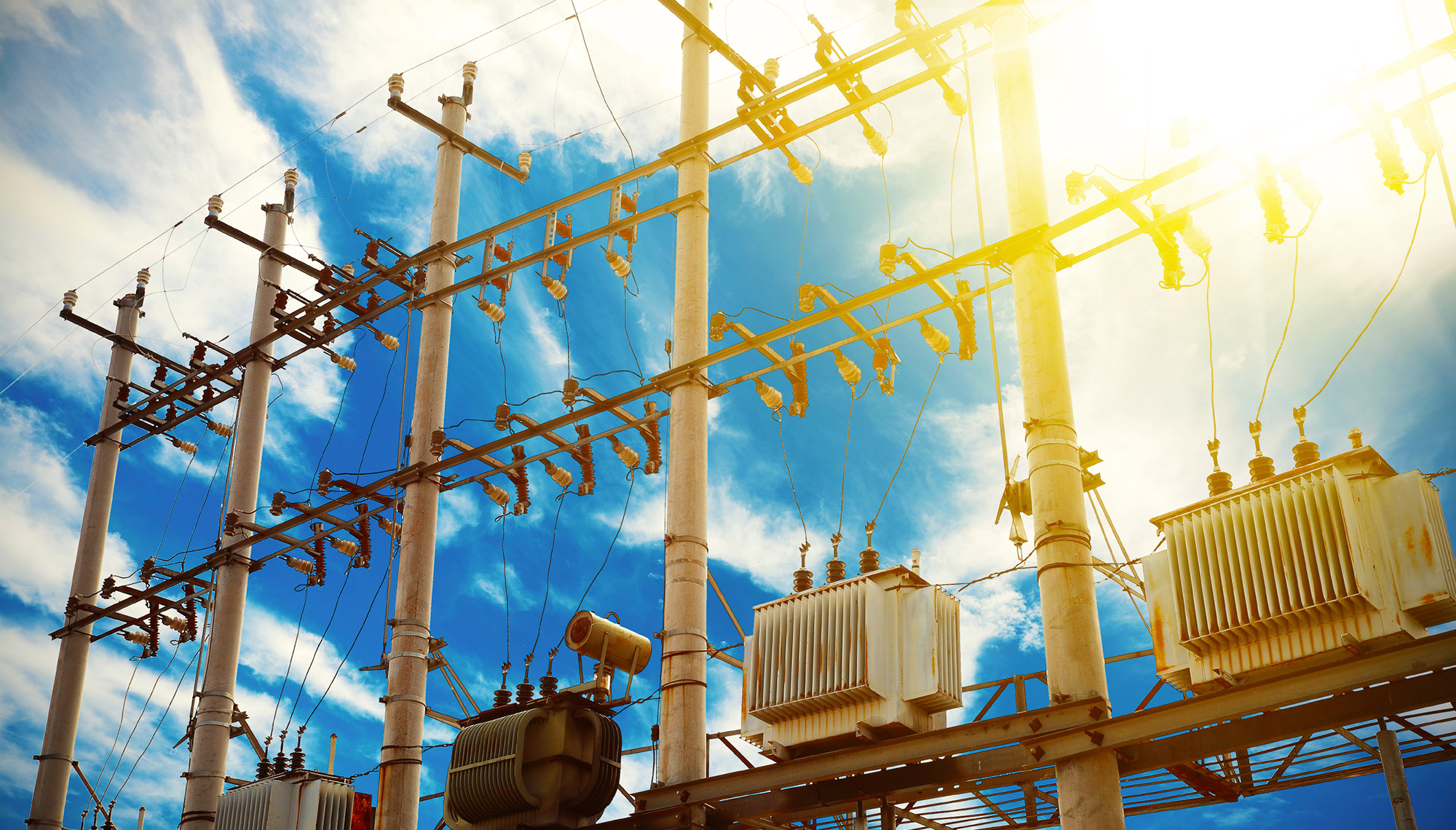 power transforemer against colurful sky