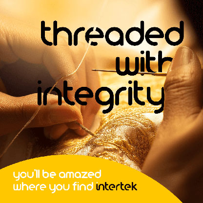 Person sewing with gold thread